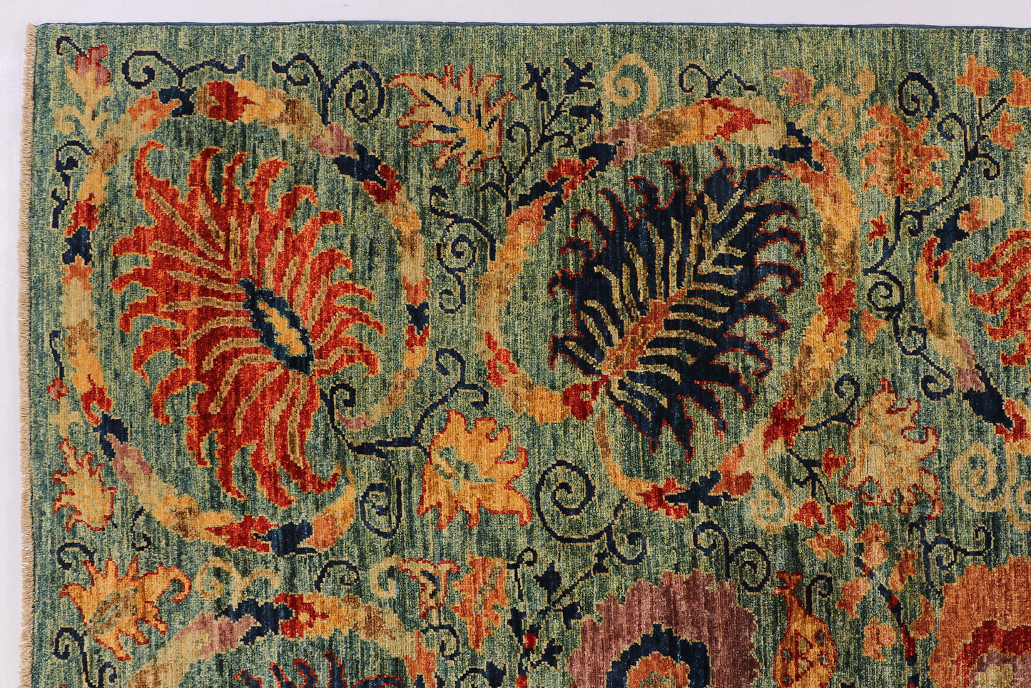 SUZANI HANDMADE WOOL AREA RUG   8’ X 10’