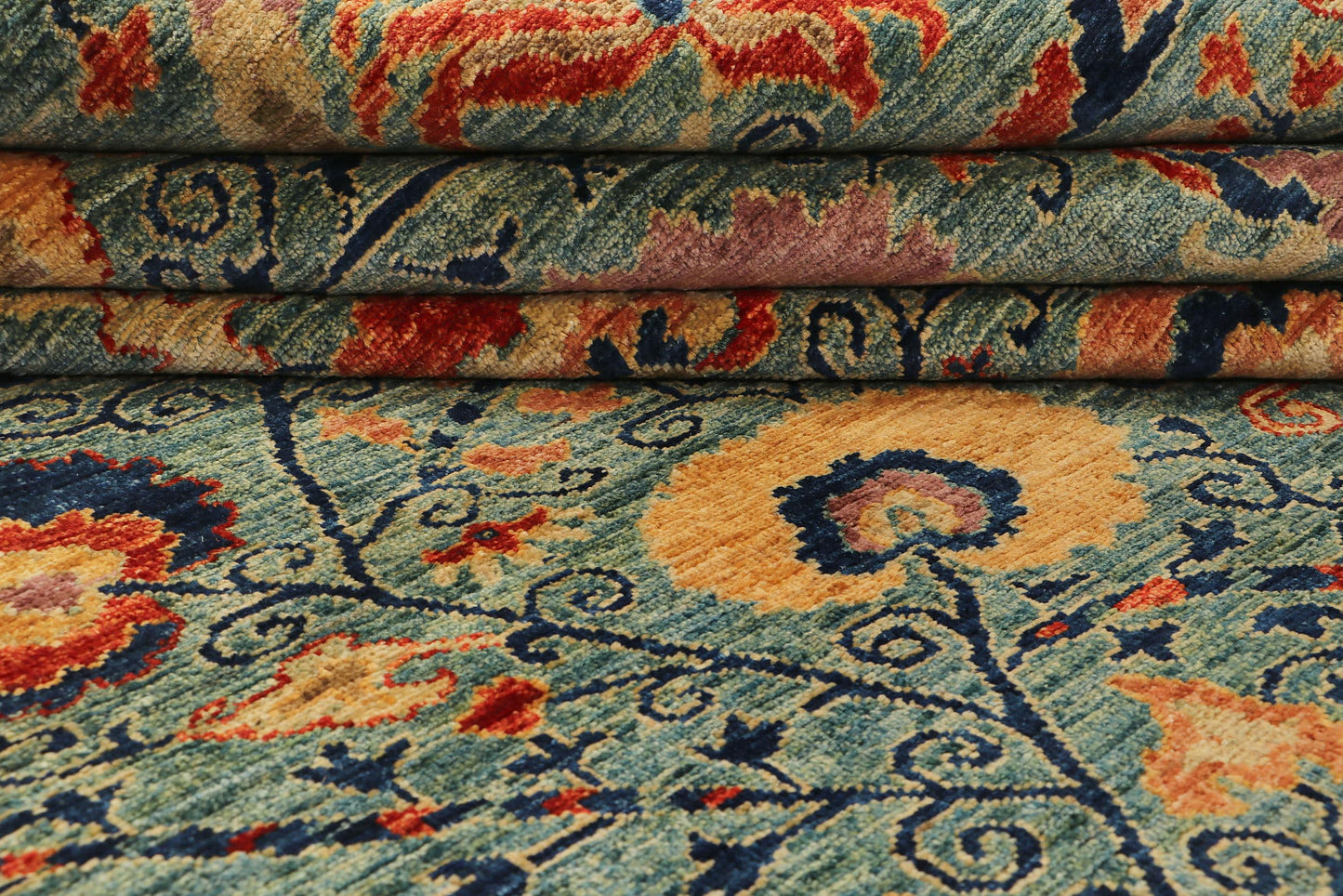 SUZANI HANDMADE WOOL AREA RUG   8’ X 10’