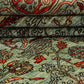 KHOTAN HANDMADE WOOL AREA RUG      8’ X 10’