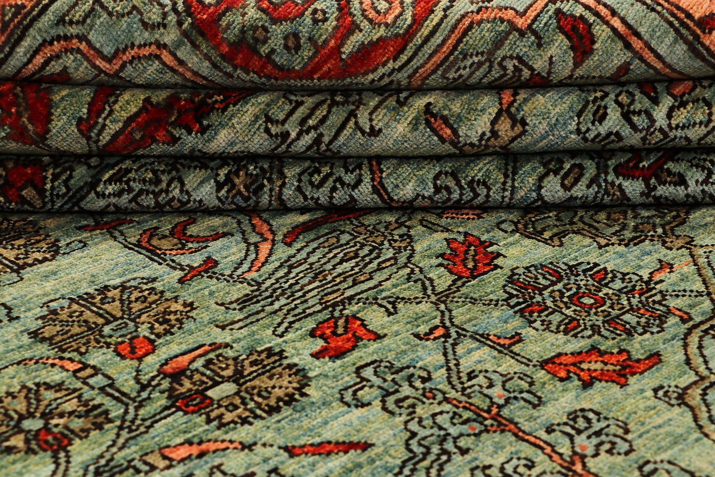 KHOTAN HANDMADE WOOL AREA RUG      8’ X 10’