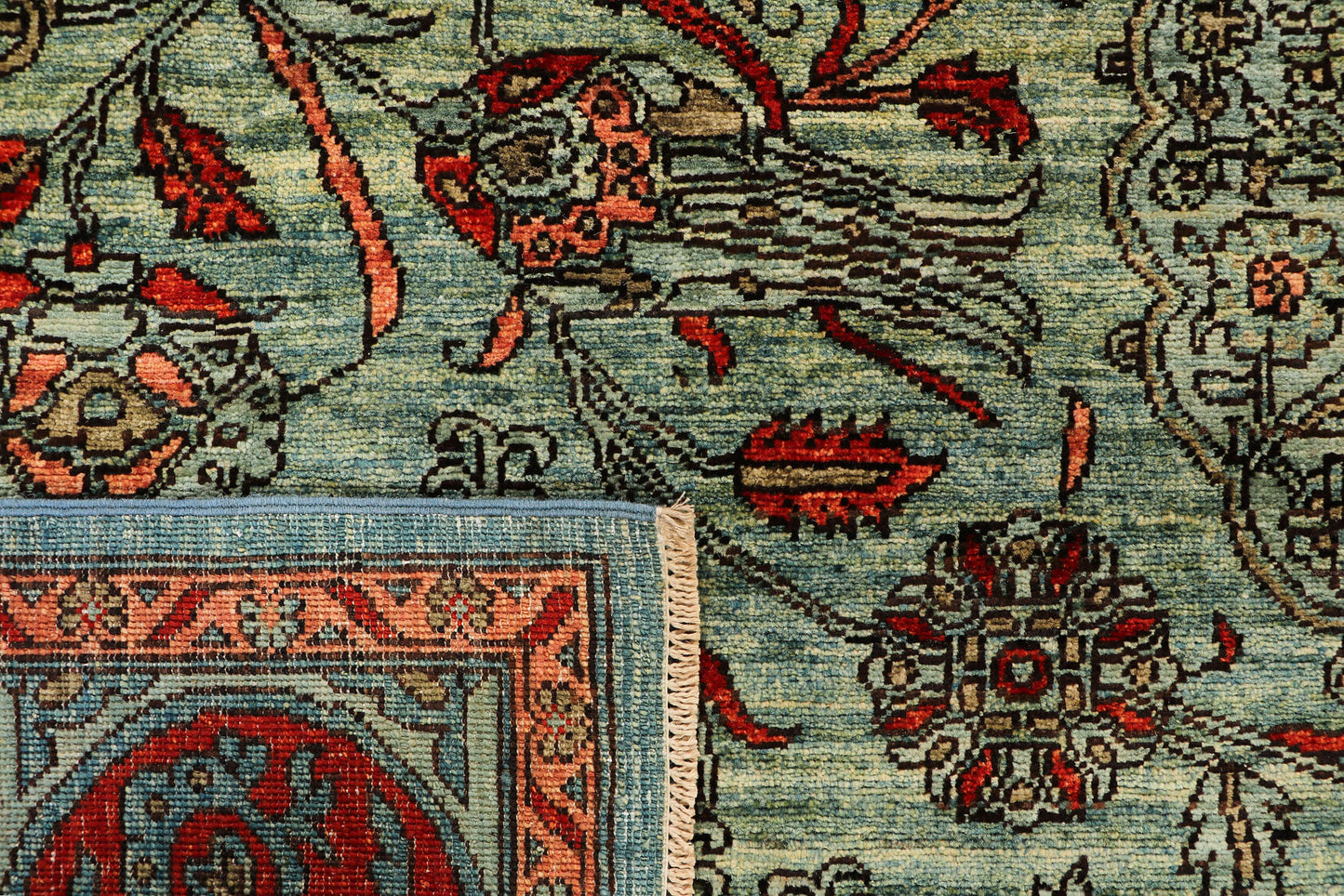 KHOTAN HANDMADE WOOL AREA RUG      8’ X 10’