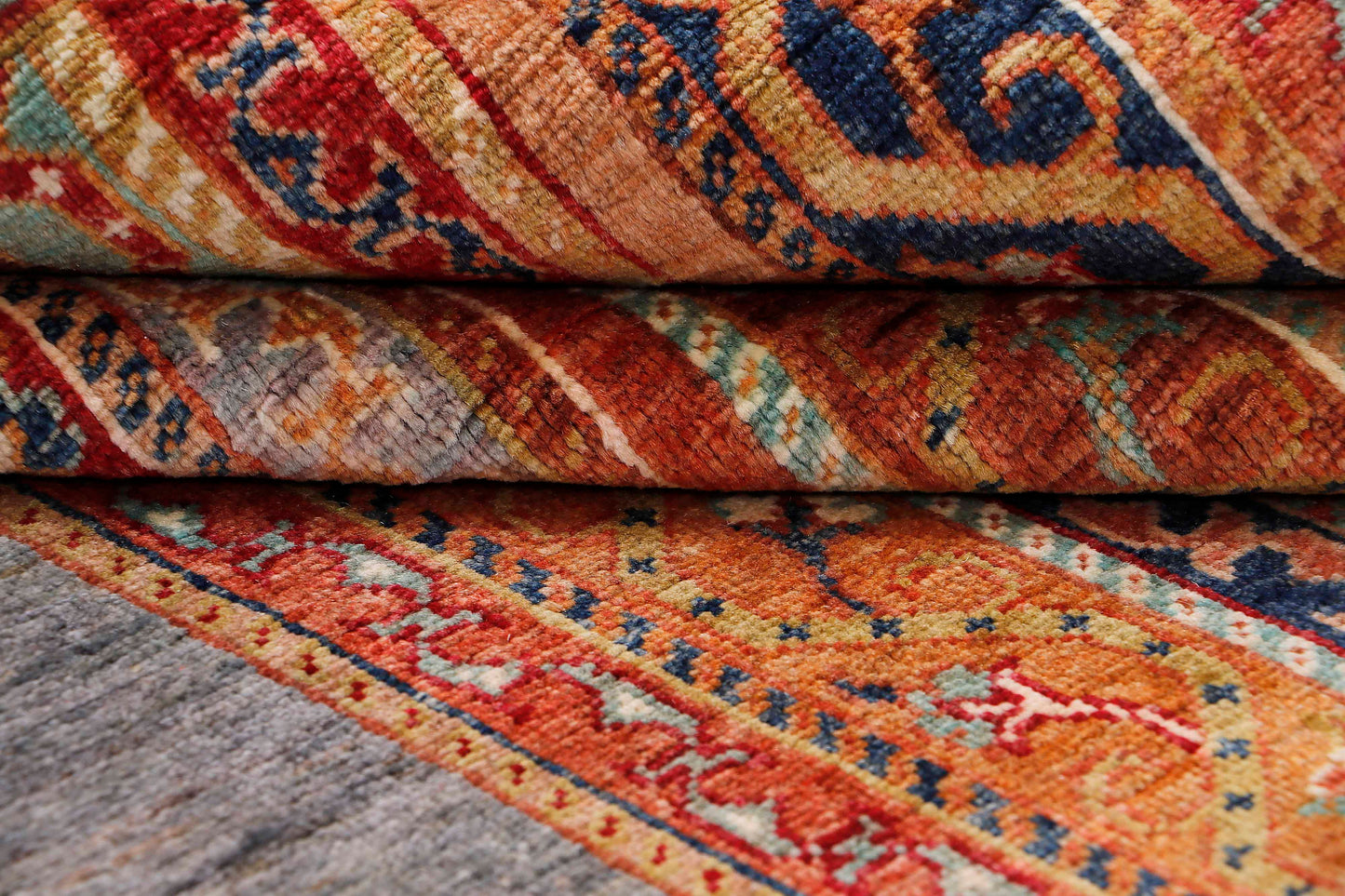 MOHARAMAT HANDMADE WOOL AREA RUG  5’ X 7’