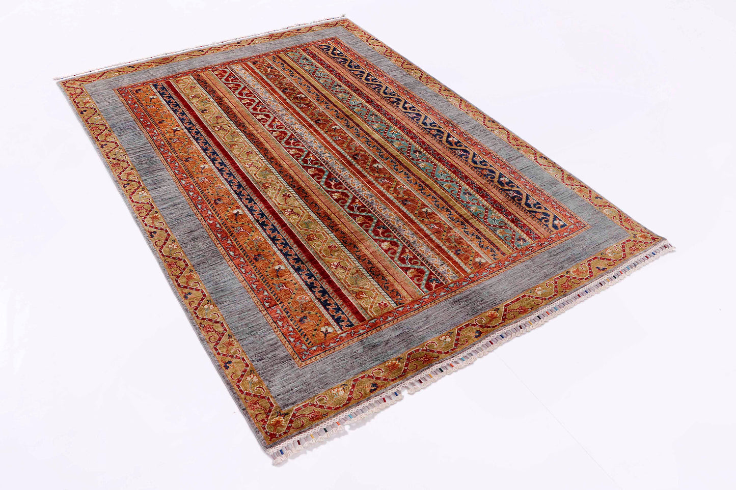 MOHARAMAT HANDMADE WOOL AREA RUG  5’ X 7’