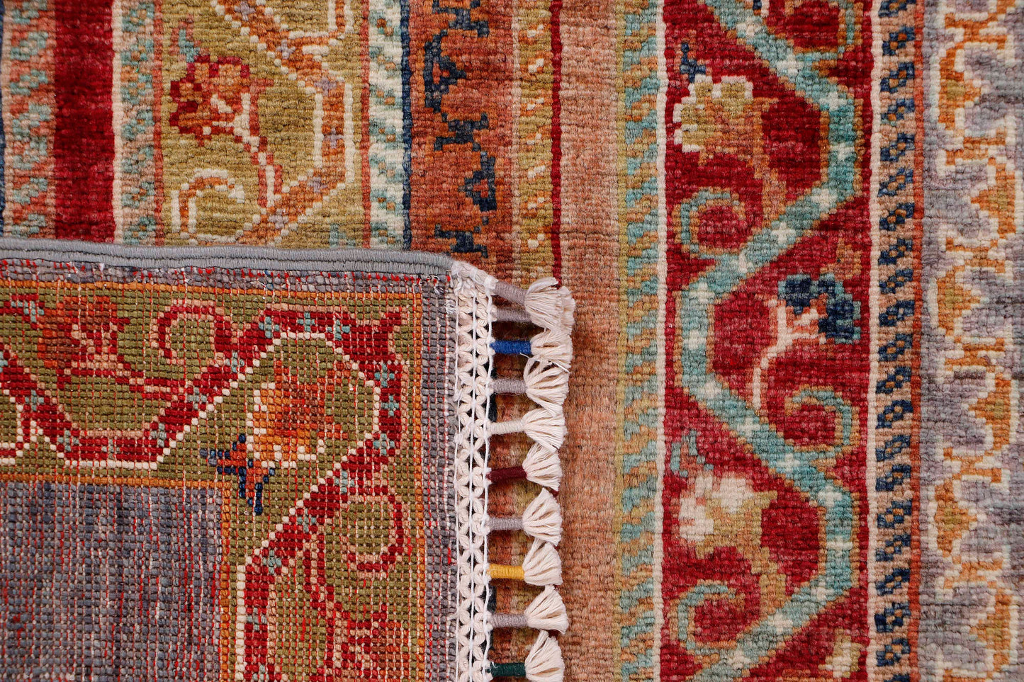 MOHARAMAT HANDMADE WOOL AREA RUG  5’ X 7’