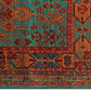 TEIMURI HANDMADE WOOL AREA RUG    5’ X 7'